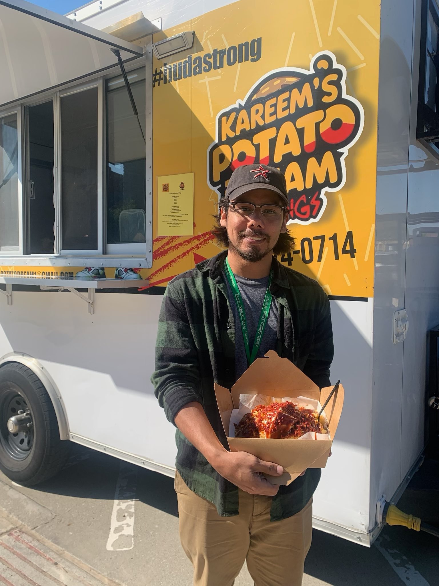 Happy customer with loaded potato